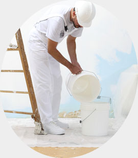 Painter working on house interior