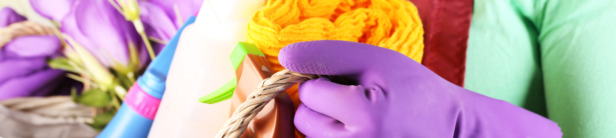Cleaning lady carrying cleaning supplies