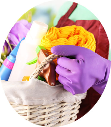 Cleaning lady carrying cleaning supplies